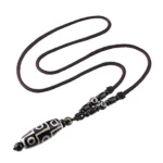 Nine Eyed Dzi Bead Amulet - Comprar online
